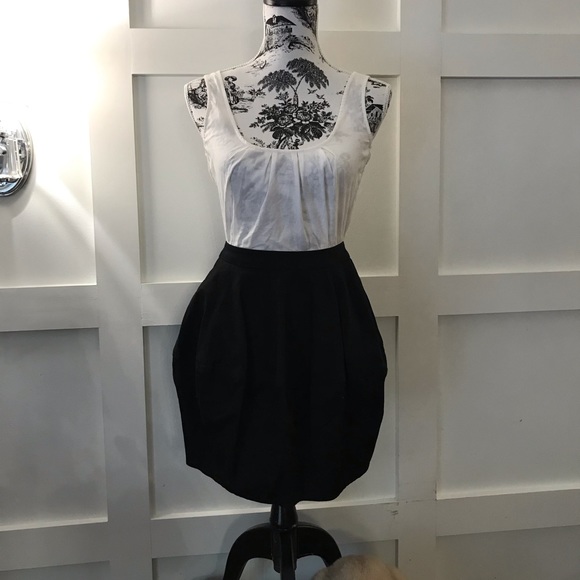 Bardot lace back top with puff skirt and pockets. - Picture 1 of 7